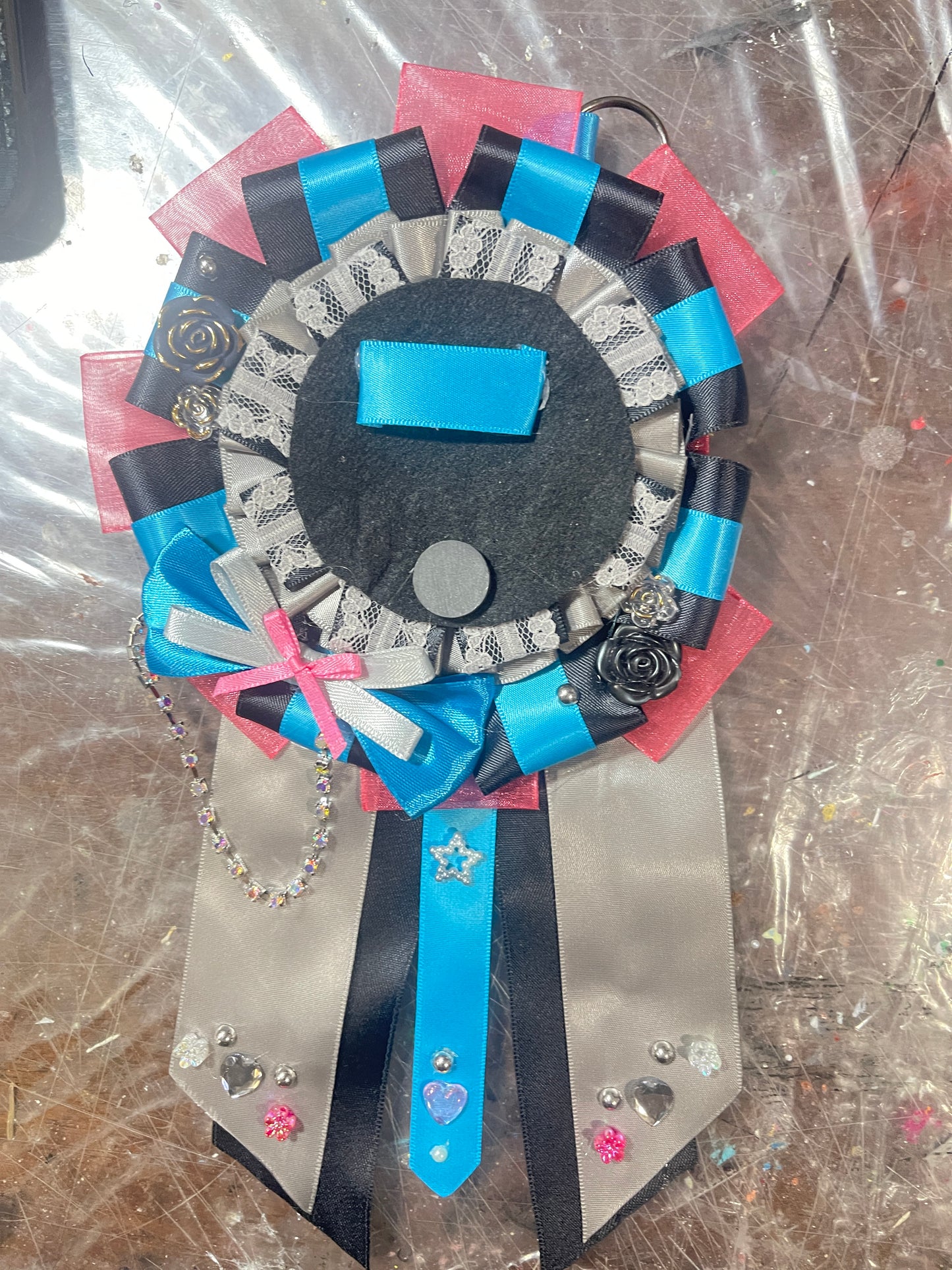 Pink, black and blue inspired can badge rosette